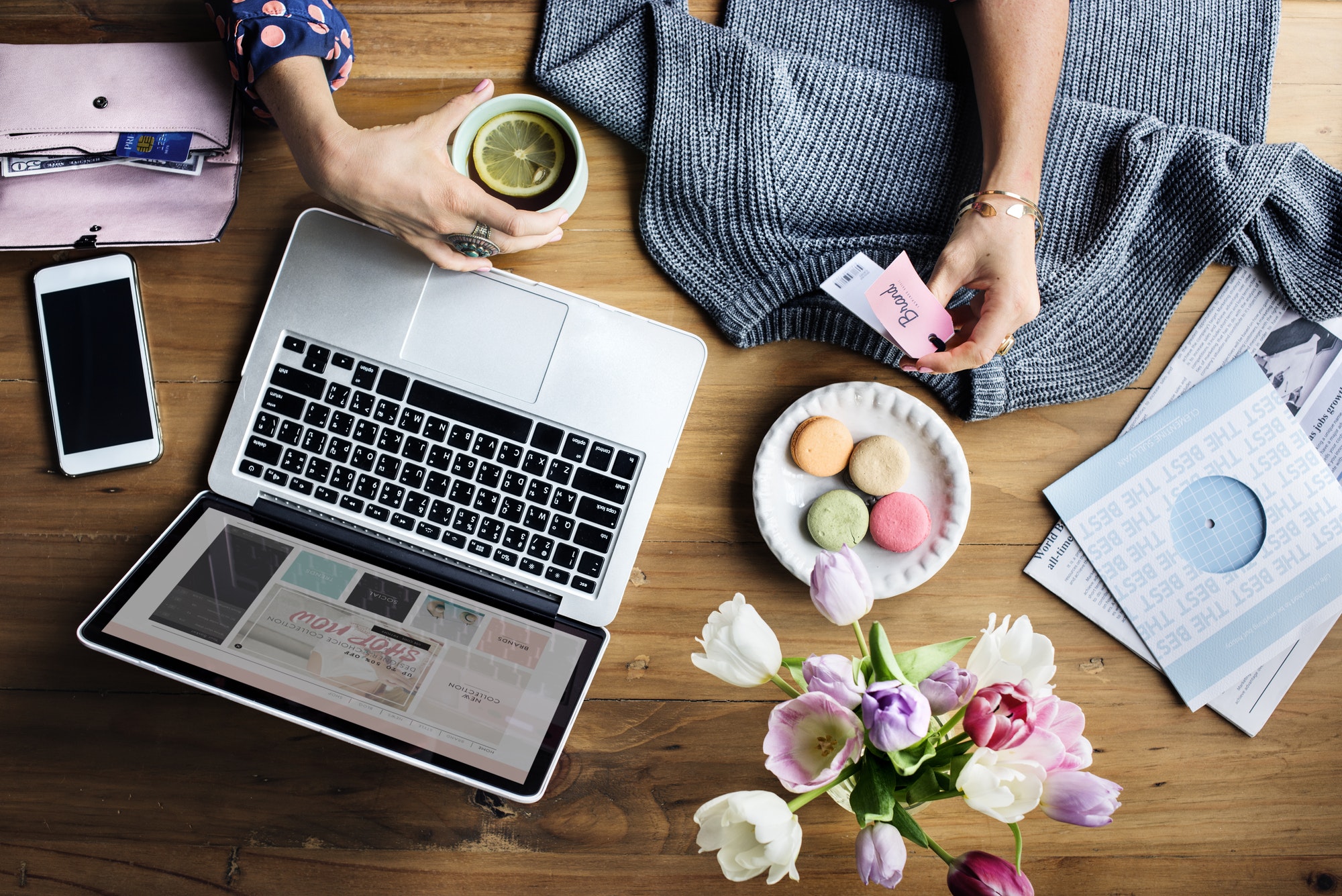 Woman Using Laptop Shopping Online